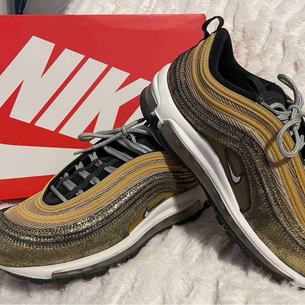 Nike Woman’s Metallic Gold and Black Sneakers